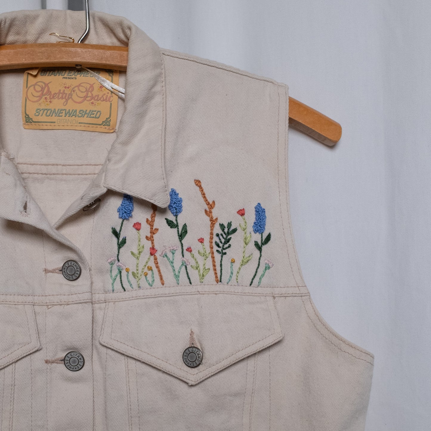 "Pocket of Flowers" cream vest with needlepoint and hand embroidery