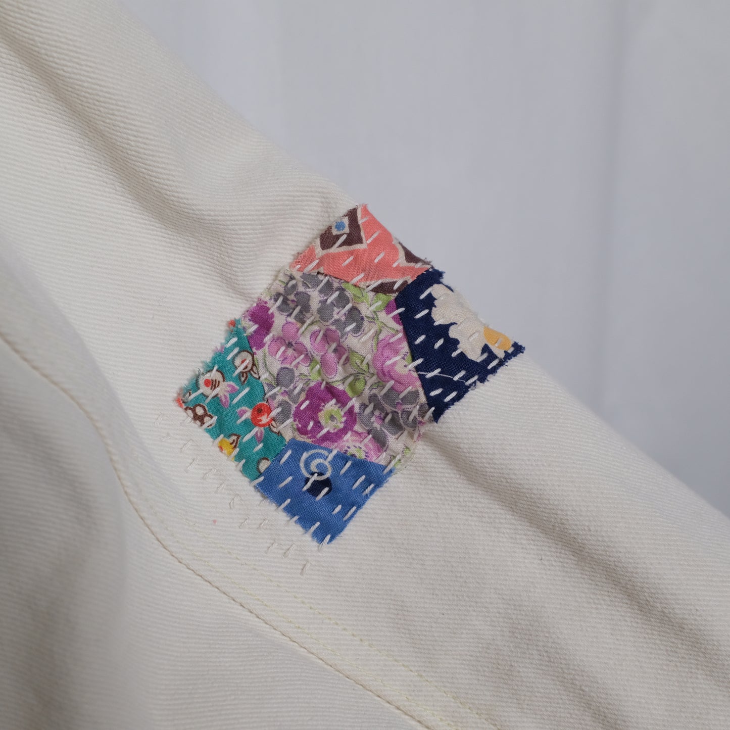 Vintage Cream Denim Jacket with vintage quilt appliques